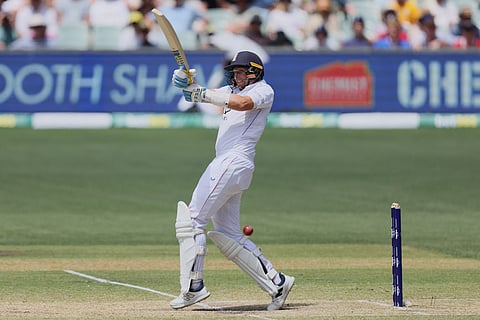England's Joe Root bats during play on day four of the third Ashes cricket test between England and Australia in Adelaide, Australia.