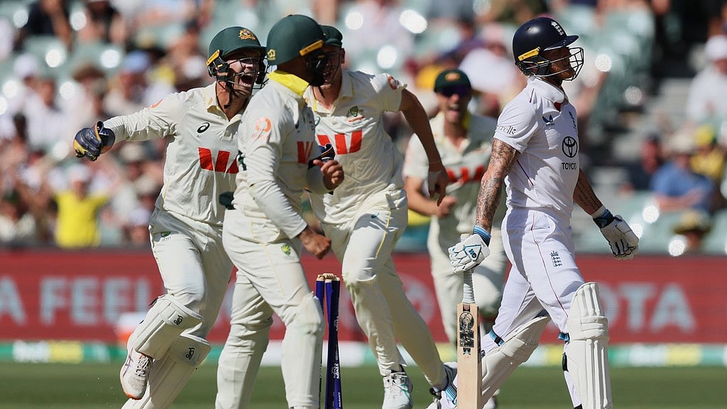 AP : Australian players celebrate after England's Ben Stokes, right, was dismissed during play on day four of the third Ashes Test in Adelaide.