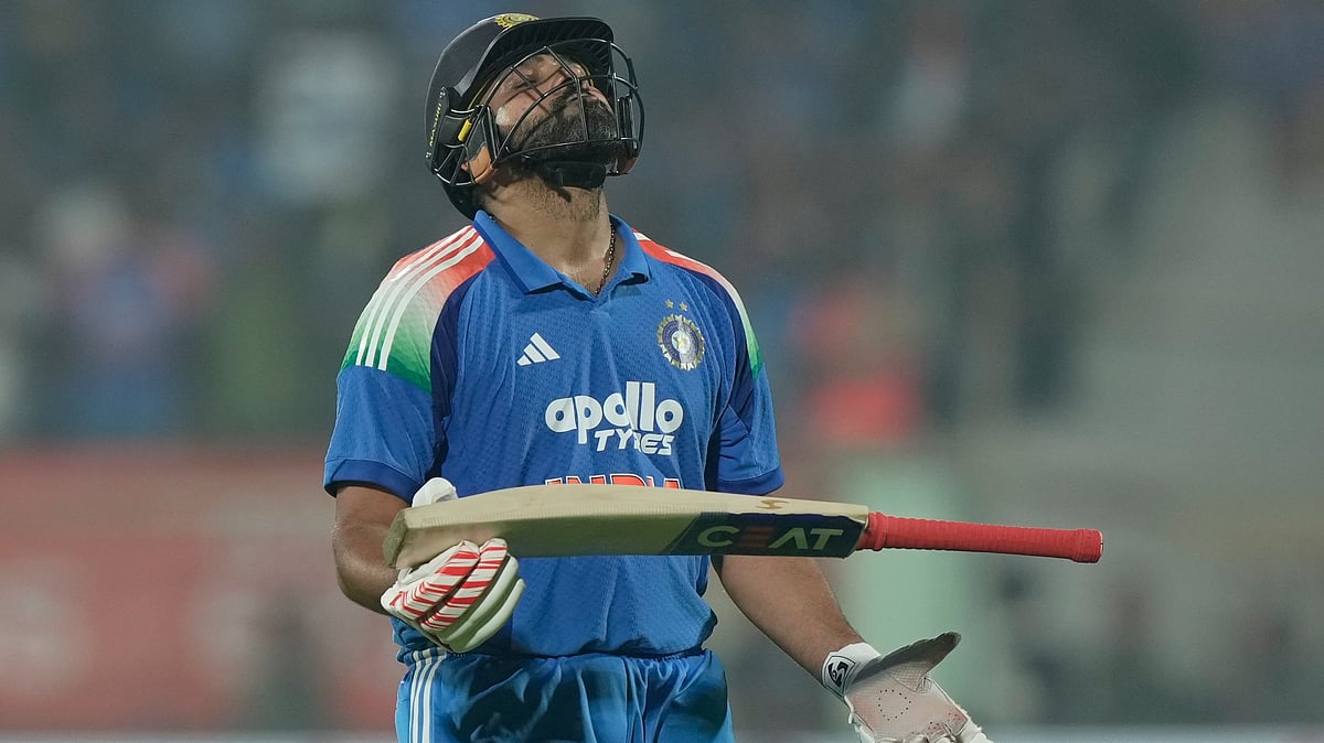 | Phoot: AP/Mahesh Kumar A. : India's Rohit Sharma reacts while leaves the field after losing his wicket during the third One Day International cricket match between India and South Africa in Visakhapatnam, India, Saturday, Dec. 6, 2025. 