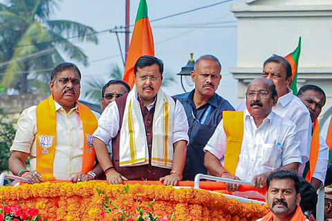 BJP National Working President Nitin Nabin, second left, with Puducherry Home Minister Arumugam Namassivayam, left, and state BJP president VP Ramalingam, right, during a roadshow, in Puducherry. State BJP in-charge Nirmal Kumar Surana, back right, is also seen. 