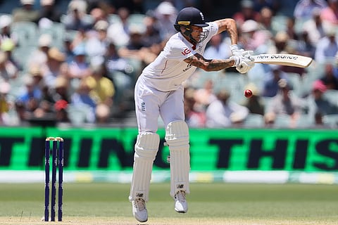 England's Brydon Carse plays a shot during play on the final day of the third Ashes cricket test between England and Australia in Adelaide, Australia.
