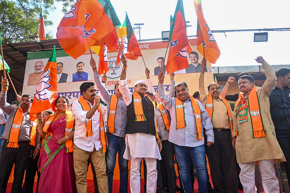 PTI : BJP Maharashtra President Ravindra Chavan, third right, and party leaders celebrate victory in the Maharashtra local body elections, at the BJP head office, in Mumbai, on Sunday, Dec. 21, 2025. 