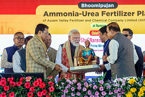 Prime Minister Narendra Modi during the foundation stone laying of a Rs 10,601-crore brownfield ammonia-urea plant of Assam Valley Fertiliser and Chemical Company Ltd (AVFCCL), at Namrup, in Dibrugarh district. Assam Chief Minister Himanta Biswa Sarma, Union Minister Sarbananda Sonowal and are also seen. 