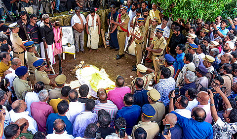 Police personnel present a guard of honour as the mortal remains of late Malayalam actor Sreenivasan lie in state during his final rites, in Kochi.
