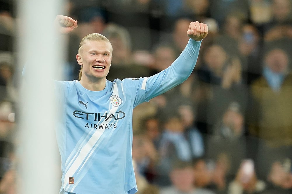 | Photo: AP/Dave Thompson : Manchester City's Erling Haaland celebrates after scoring his sides third goal of the game during the English Premier League soccer match between Manchester City and West Ham United in Manchester, England. 
