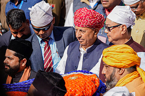 Union Minister of Parliamentary Affairs Kiren Rijiju offers a 'chadar' during the annual 'Urs' festival at the Dargah Sharif, shrine of Sufi saint Khwaja Moinuddin Chishti, in Ajmer.