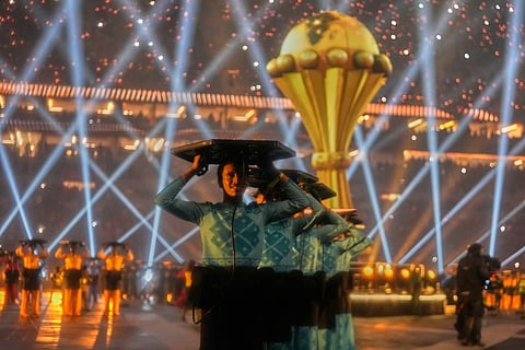 Performers take part in the opening ceremony of the Africa Cup of Nations and the opening group A soccer match between Morocco and Comoros in Rabat, Morocco.