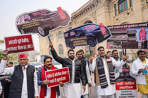 Samajwadi Party MLAs stage a protest over Codeine cough syrup case during the Winter session of Uttar Pradesh Assembly, in Lucknow.
