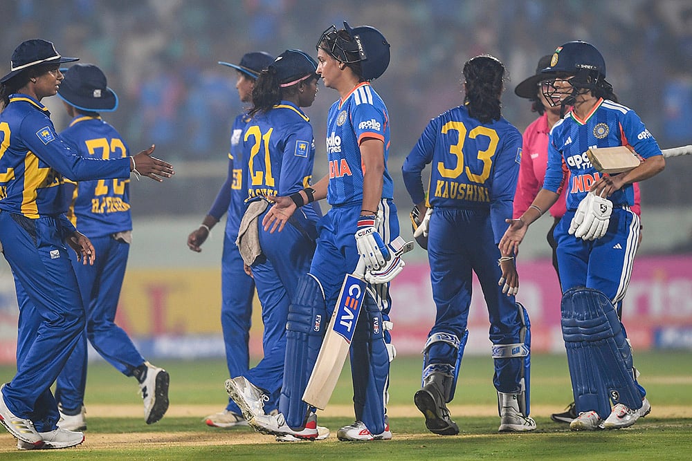 | Photo: PTI : India's captain Harmanpreet Kaur and Jemimah Rodrigues greet Sri Lankan players at the end of play after India won the Women’s T20I cricket match against Sri Lanka, in Visakhapatnam, Andhra Pradesh.
