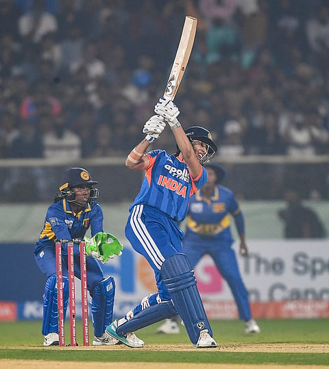 India's Smriti Mandhana plays a shot during the first Women's T20I cricket match between India and Sri Lanka, in Visakhapatnam, Andhra Pradesh.