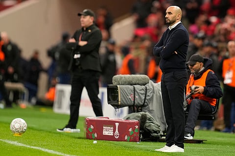 Morocco's head coach Walid Regragui watches the play during the Africa Cup of Nations group A soccer match between Morocco and Comoros in Rabat, Morocco.