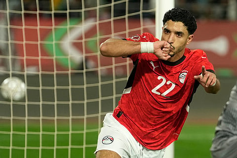 Egypt's Omar Marmoush celebrates after scoring during the Africa Cup of Nations group B soccer match between Egypt and Zimbabwe in Agadir, Morocco.