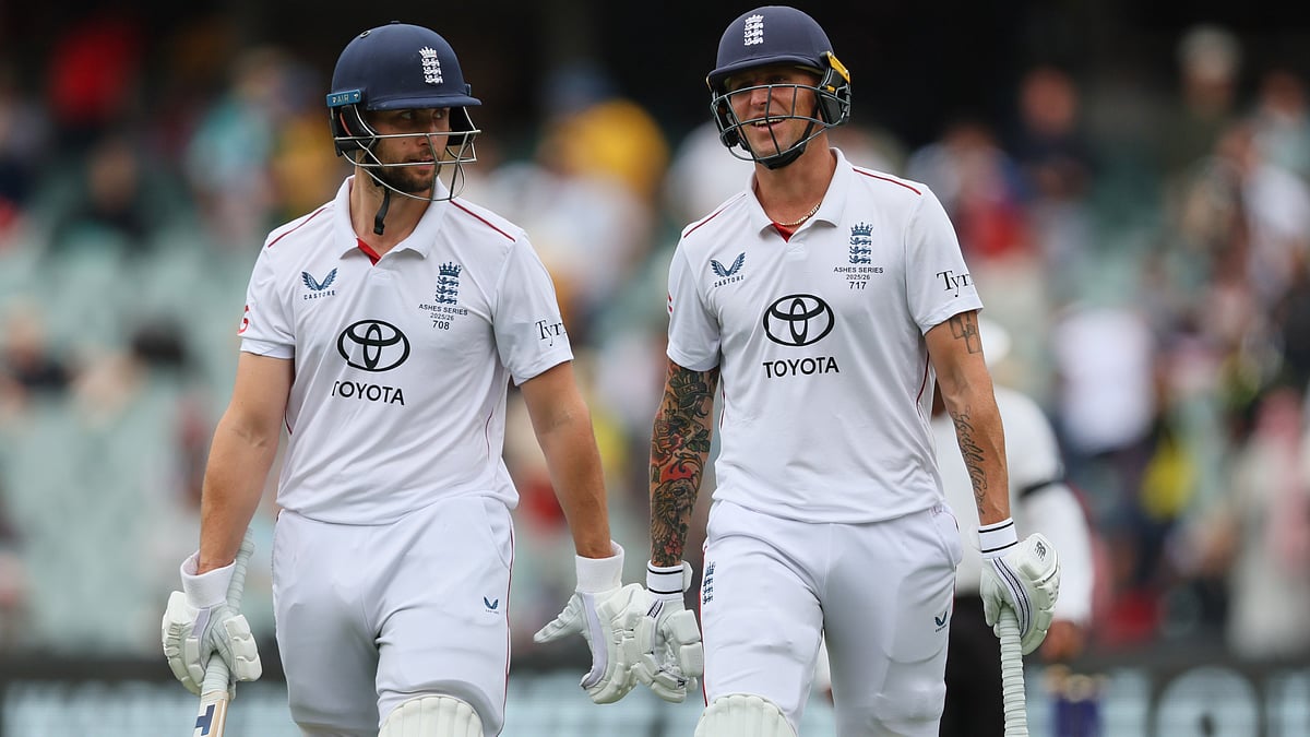 | Photo: AP/James Elsby : England's Brydon Carse, right, and Will Jacks walk from the field for the lunch break during play on the final day of the third Ashes cricket test between England and Australia in Adelaide, Australia, Sunday, Dec. 21, 2025. 