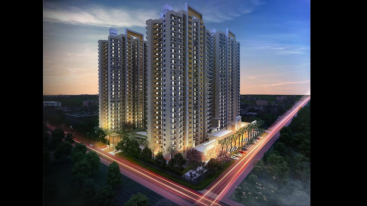 Night view of Civitech Strings illuminated high-rise residential towers