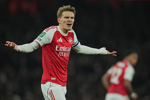 Arsenal's Martin Odegaard reacts during the English Football League Cup quarter-final soccer match between Arsenal and Crystal Palace in London.