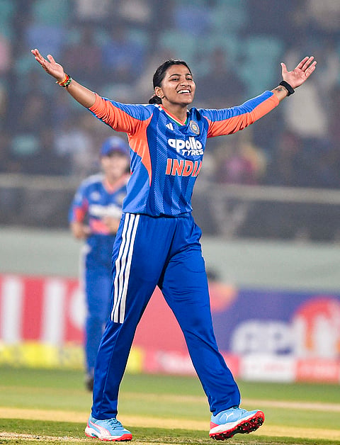 India's Sneh Rana celebrates after taking the wicket of Sri Lanka's captain Chamari Athapaththu during the second T20I cricket match between India and Sri Lanka, in Visakhapatnam, Andhra Pradesh.
