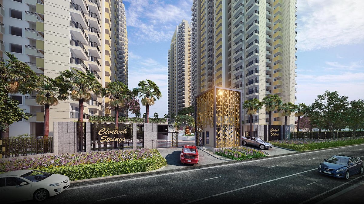 Entrance view of Civitech Strings residential towers with landscaped driveway