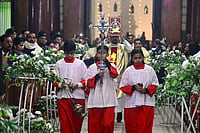Photo: PTI : Prayagraj: People from the Christian community during the Christmas midnight mass at St. Joseph's Cathedral, in Prayagraj, Wednesday night, Dec. 24, 2025. (PTI Photo)(PTI12_25_2025_000019B)