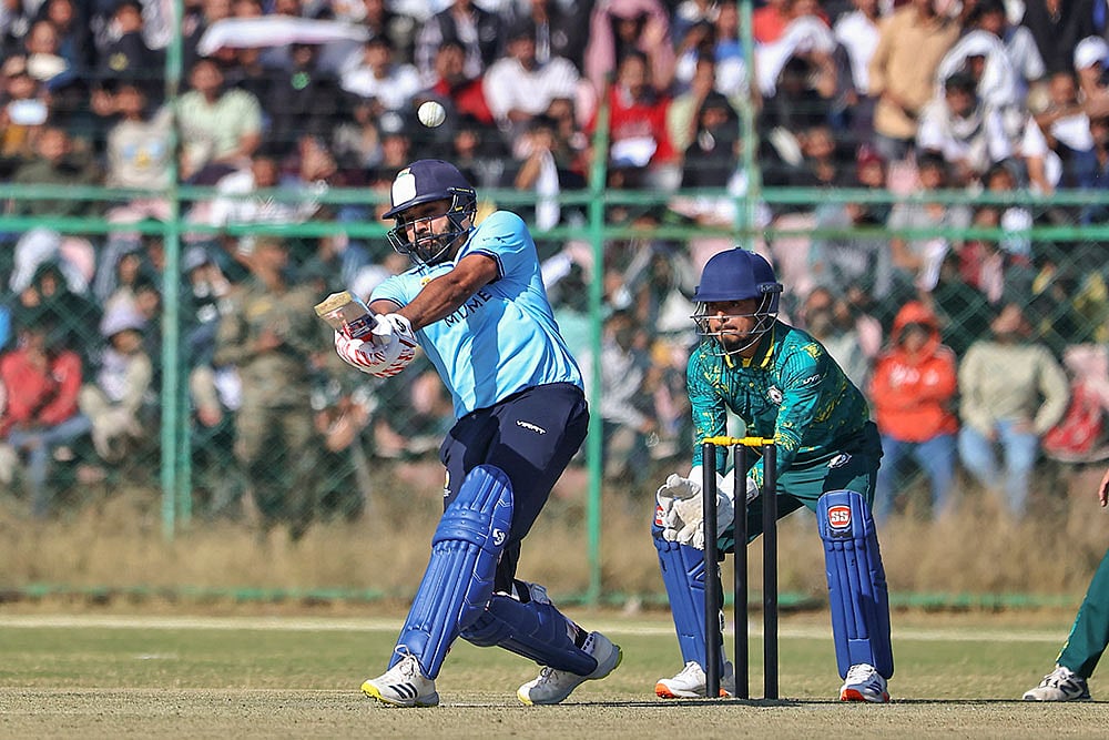 | Photo: PTI : Mumbai's Rohit Sharma plays a shot during the Vijay Hazare Trophy 2025-26 cricket match between Mumbai and Sikkim, at Sawai Mansingh Stadium, in Jaipur.