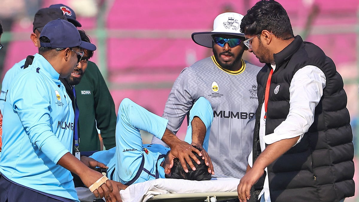 Photo: PTI : Angkrish Raghuvanshi being taken off the field on a stretcher after an injury during the Vijay Hazare Trophy 2025-26 cricket match between Mumbai and Uttarakhand, at Sawai Mansingh Stadium in Jaipur.