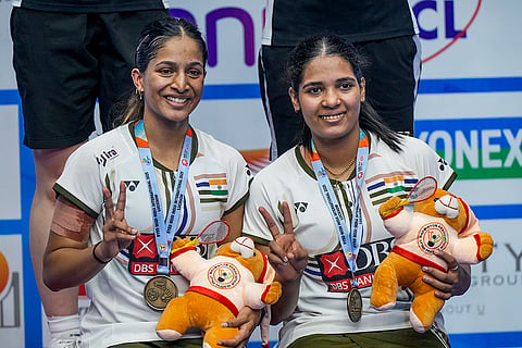 India’s Treesa Jolly, right, and Gayatri Gopichand Pullela pose with the medals after winning the women’s doubles final match at the Syed Modi International Super 300 badminton tournament, at Babu Banarasi Das Badminton Stadium, in Lucknow, Uttar Pradesh, Sunday, Nov. 30, 2025. 
