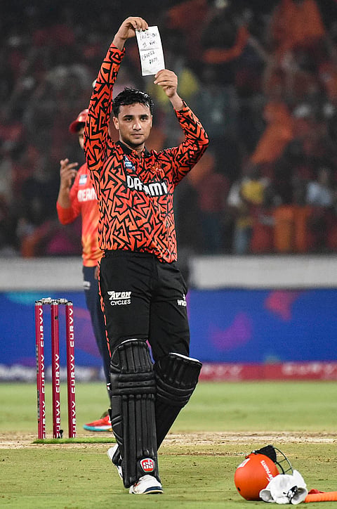 Sunrisers Hyderabad's Abhishek Sharma celebrates his century during an Indian Premier League (IPL) 2025 T20 cricket match between Sunrisers Hyderabad and Punjab Kings, at Rajiv Gandhi International Cricket Stadium, Uppal, in Hyderabad, Saturday, April 12, 2025. 