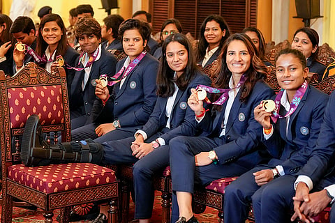 National women's cricket team members, front row from left, Deepti Sharma, Radha Yadav, Arundhati Reddy, Shafali Verma, Pratika Rawal, Renuka Singh and Uma Chetry with others during a meeting with President Droupadi Murmu following their victory in the ODI World Cup, at Rashtrapati Bhavan, in New Delhi, Thursday, Nov. 6, 2025. 