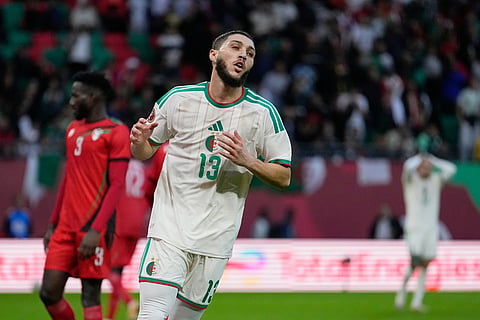 Algeria's Jaouen Hadjam reacts after failing to score during the Africa Cup of Nations group E soccer match between Algeria and Sudan in Rabat, Morocco.