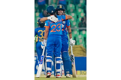 India's captain Harmanpreet Kaur with teammate Shafali Verma during the third T20 International cricket match of the series between India Women and Sri Lanka Women, at Greenfield International Stadium, in Thiruvananthapuram, Kerala.