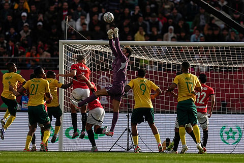 Egypt's goalkeeper Mohamed Sobhy clears the ball during the Africa Cup of Nations group B soccer match between Egypt and South Africa in Agadir, Morocco.