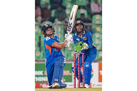 India's Shafali Verma plays a shot during the third T20 International cricket match of a series between India Women and Sri Lanka Women, at Greenfield International Stadium, in Thiruvananthapuram, Kerala.