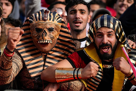 Egypt fans support their team during the Africa Cup of Nations group B soccer match between Egypt and South Africa in Agadir, Morocco.