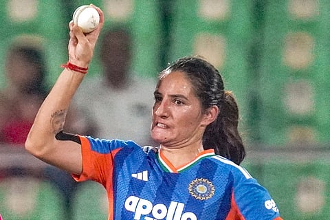 India’s Renuka Singh bowls a delivery during the third T20 International cricket match of a series between India Women and Sri Lanka Women, at Greenfield International Stadium, in Thiruvananthapuram, Kerala.