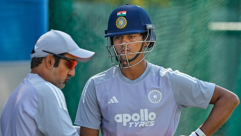 | Photo: AP/Anupam Nath : India's chief coach Gautam Gambhir, left, talks to Yashasvi Jaiswal during a practice session at net ahead of the second test match between India and South Africa in Guwahati.