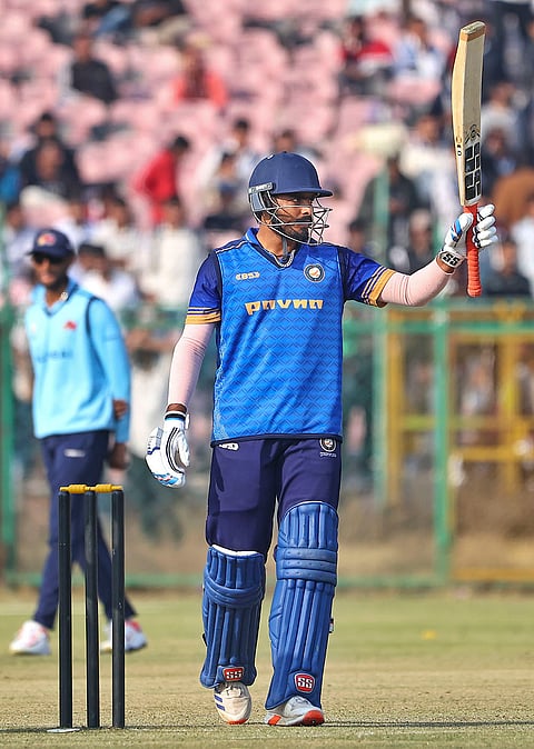 Uttarakhand’s Yuvraj Chaudhary celebrates his half century during a Vijay Hazare Trophy 2025-26 cricket match between Mumbai and Uttarakhand, at Sawai Mansingh Stadium, in Jaipur, Rajasthan.