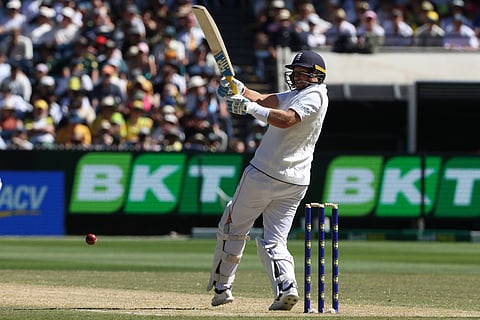 England's Joe Root bats against Australia on Day 2 of their Ashes cricket test match in Melbourne.