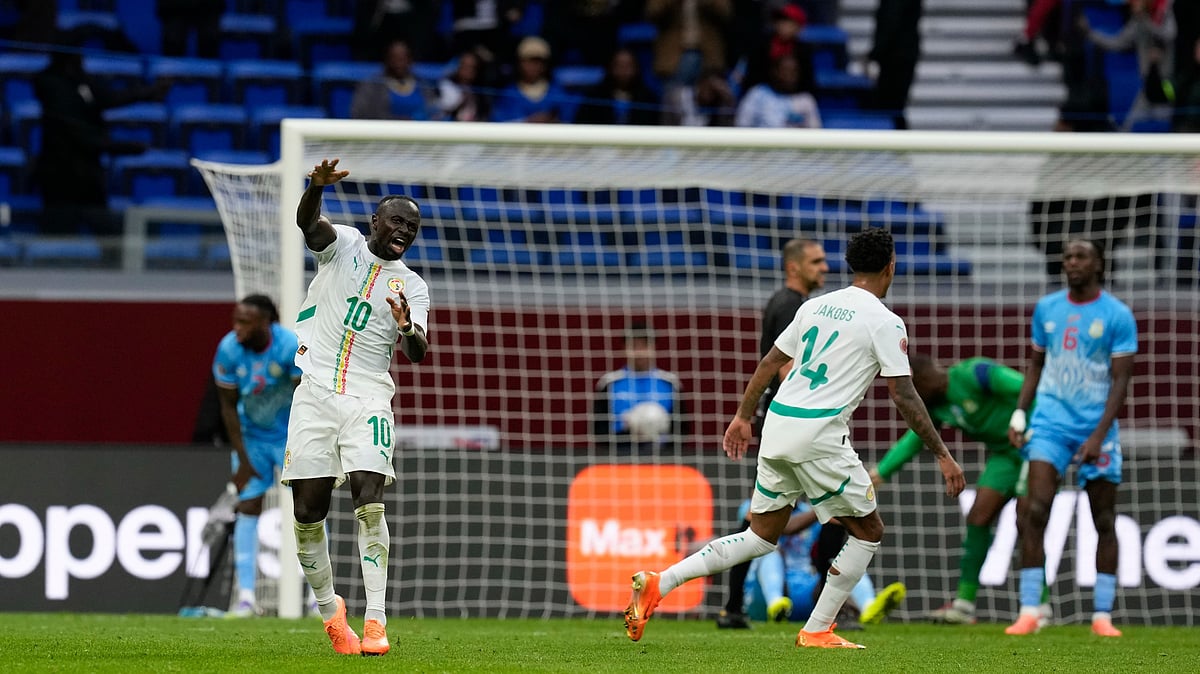 (AP Photo/Themba Hadebe) : Senegal's Sadio Mane reacts after scoring a goal during the Africa Cup of Nations group D soccer match between Senegal and DR Congo in Tangier, Morocco, Saturday, Dec. 27, 2025.