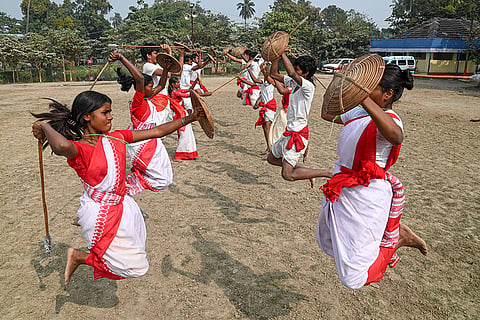 Students display activities at a Bratachari training camp, in Kolkata.