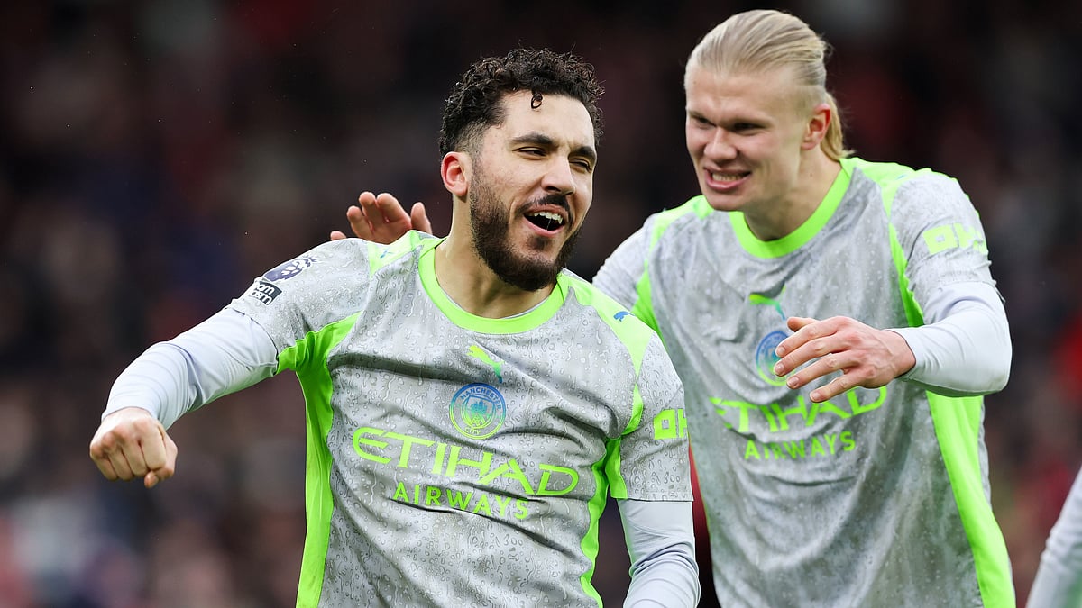 (Barrington Coombs/PA via AP) : Manchester City's Rayan Cherki, left, celebrates with Erling Haaland after scoring his side's second goal during the Premier League match between Nottingham Forest and Manchester City, in Nottingham, England, Saturday Dec. 27, 2025