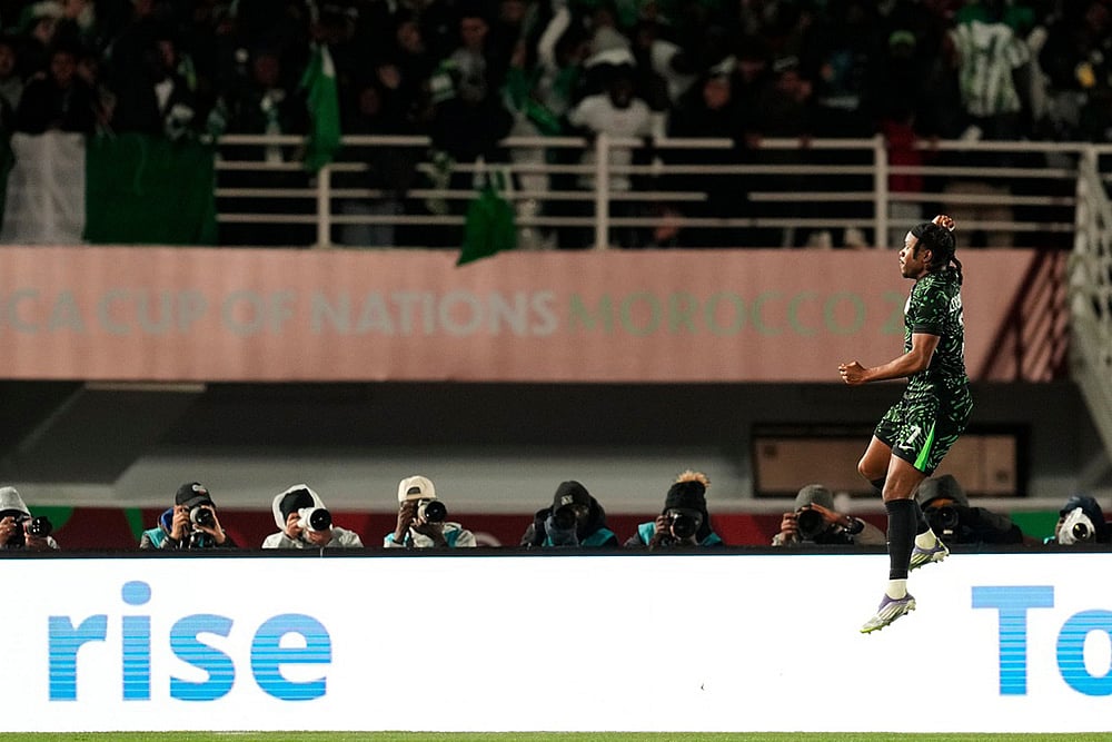 | Photo: AP/Mosa'ab Elshamy : Nigeria's Ademola Lookman celebrates after scoring his side's third goal during the Africa Cup of Nations group C soccer match between Nigeria and Tunisia in Fez, Morocco.