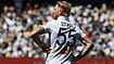 | Photo: AP/Hamish Blair : England's Ben Stokes pauses before bowling a delivery to Australia on Day 2 of their Ashes cricket test match in Melbourne, Saturday, Dec. 27, 2025. 
