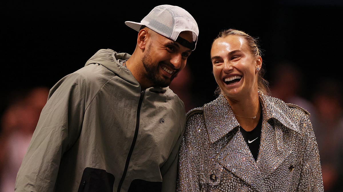 Amr Alfiky/Pool Photo via AP : Aryna Sabalenka and Nick Kyrgios laugh ahead of their Battle of the Sexes tennis match in Dubai, United Arab Emirates, Sunday Dec. 28, 2025