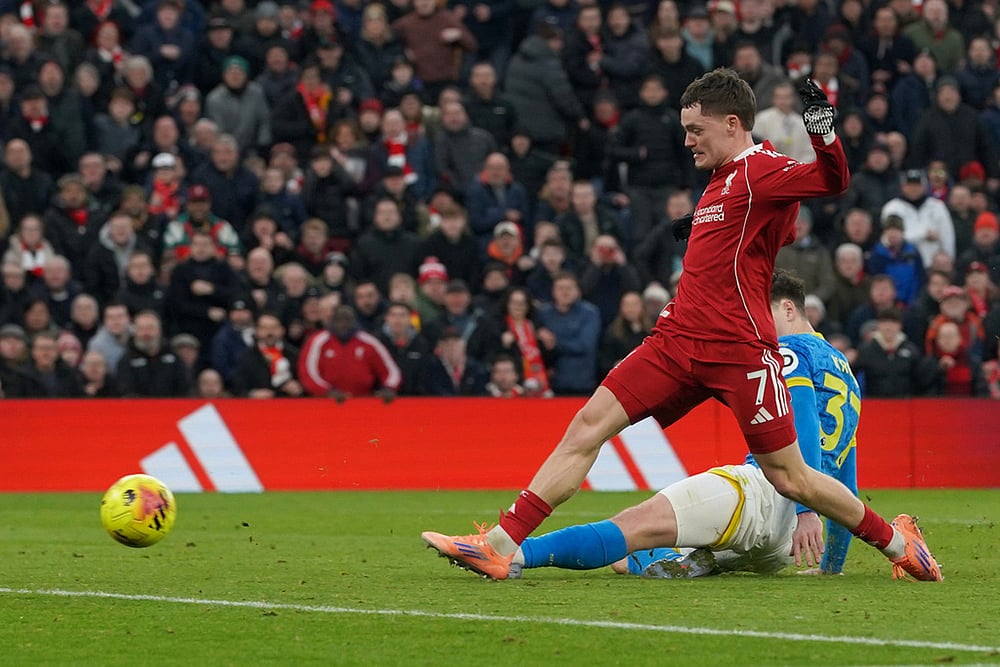 | Photo: AP/Ian Hodgson : Liverpool's Florian Wirtz scores his side's second goal during the English Premier League soccer match between Liverpool and Wolverhampton Wanderers in Liverpool.