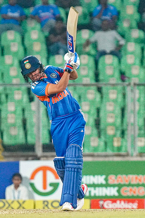 India's captain Harmanpreet Kaur plays a shot during the fourth T20 International cricket match of a series between India Women and Sri Lanka Women, at Greenfield International Stadium, in Thiruvananthapuram, Kerala.
