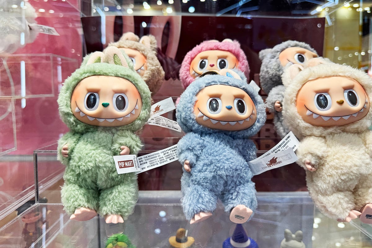 Shutterstock  : Labubu collectible toy from The Monsters by Pop Mart on display with surprise boxes. Popular designer art figure seen in stores, videos, TikTok, reels, shorts
