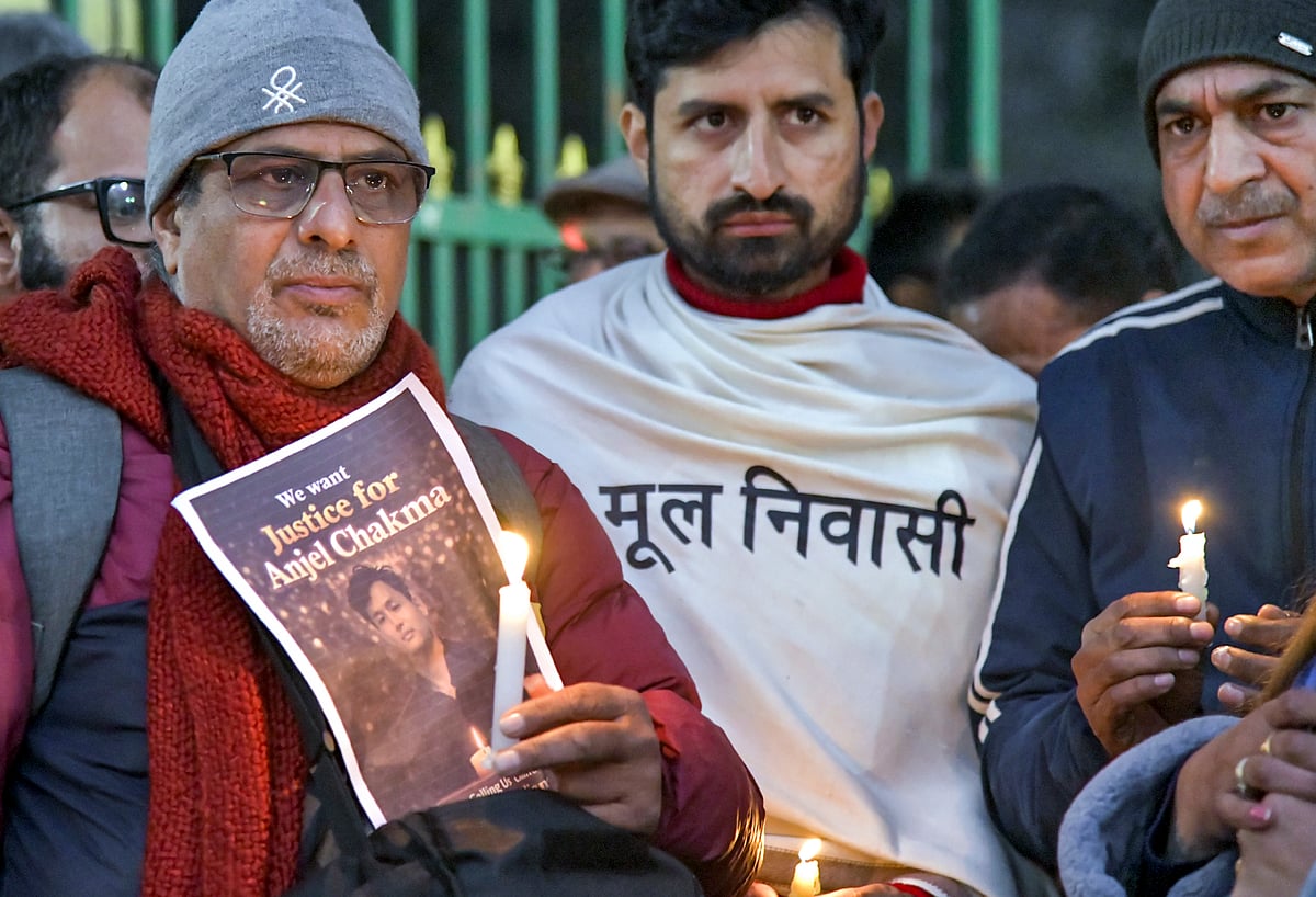 RAHULGROVER :  Members of students' organisations and locals participate in a candlelight march at Gandhi Park protesting the assault and death of Tripura student Angel Chakma, in Dehradun, Monday