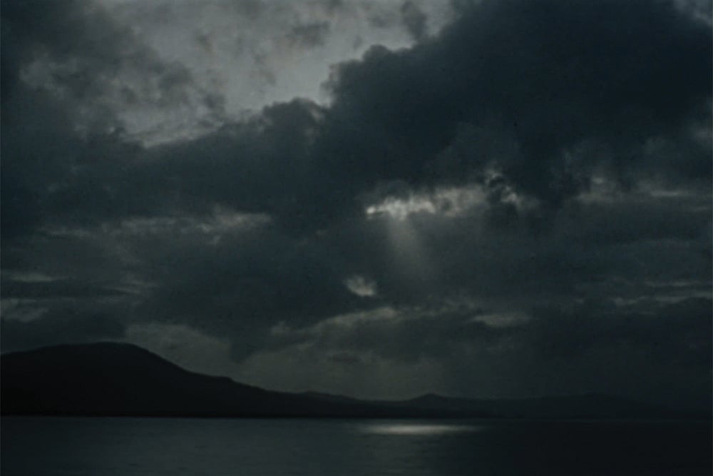 Stills from the latest film, A Breath Held Long, By Sudarshan Shetty : He walked in the rain with an excuse of a lost umbrella that he once borrowed from his mother as the raindrops poured down his cheeks like exaggerated salty sorrow that slowly pooled in his pockets submerging the cashless leather wallet that made him happy to imagine he was losing a lifetime of fortune to a grand deluge