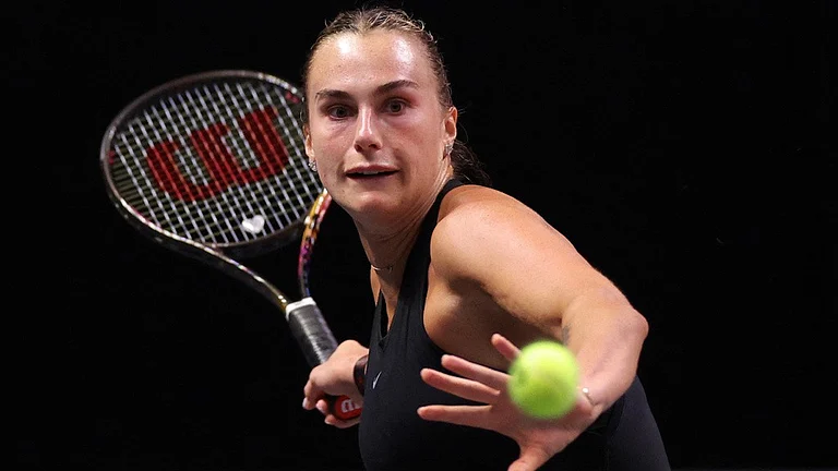 Aryna Sabalenka plays a forehand against Nick Kyrgios during their Battle of the Sexes tennis match in Dubai, United Arab Emirates. - AP