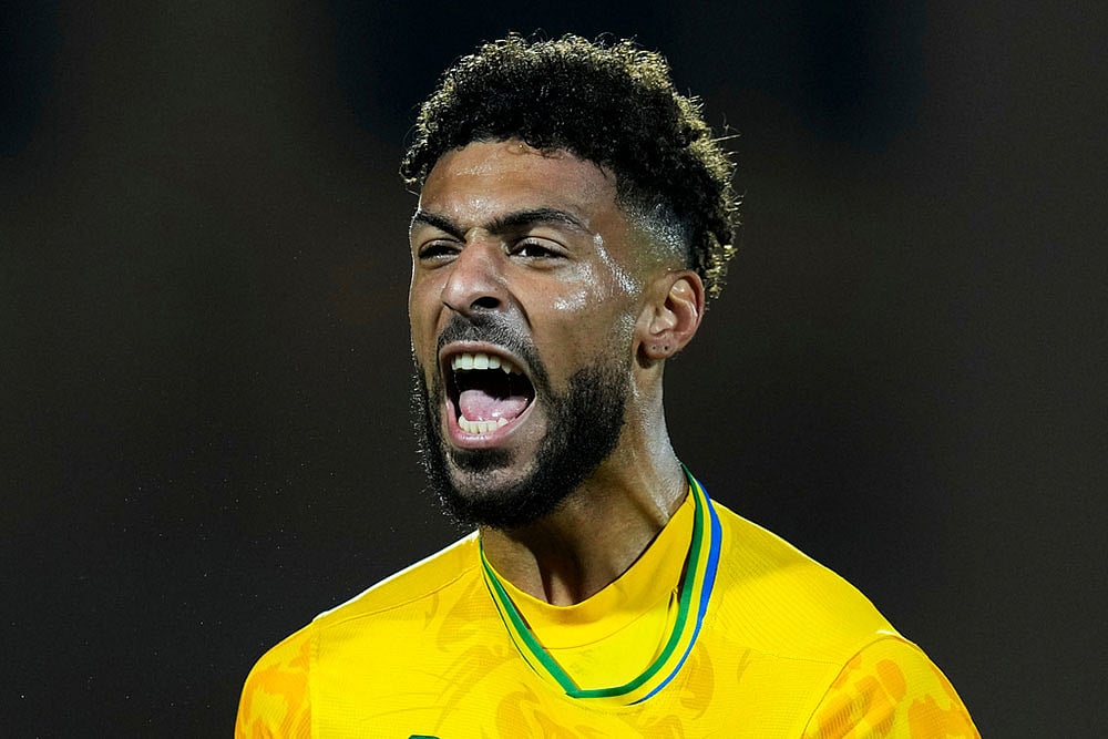 Gabons Denis Bouanga celebrates after scoring during the Africa Cup of Nations group F soccer match between Gabon and Ivory Coast, in Marrakech, Morocco.