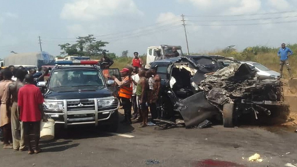 Federal Road Safety Corps via AP : In this photo provided by the Federal Road Safety Corps, people gather at the accident scene of British boxer Anthony Joshua in Lagos, Nigeria.